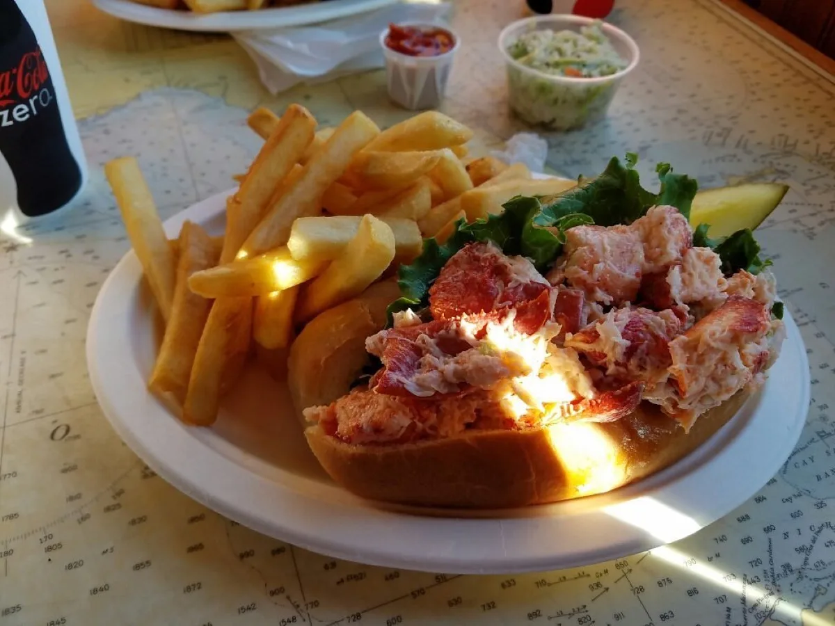 Fresh lobster roll with fries